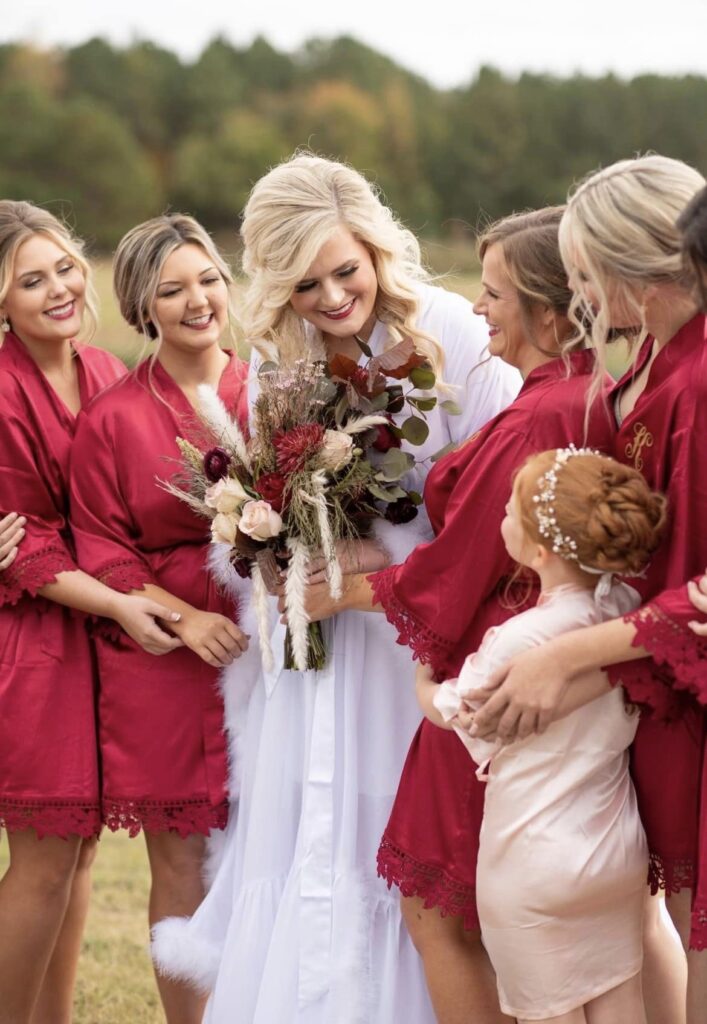 bridal party with flower bouquets