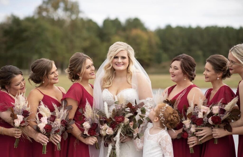 bridal party with flower bouquets